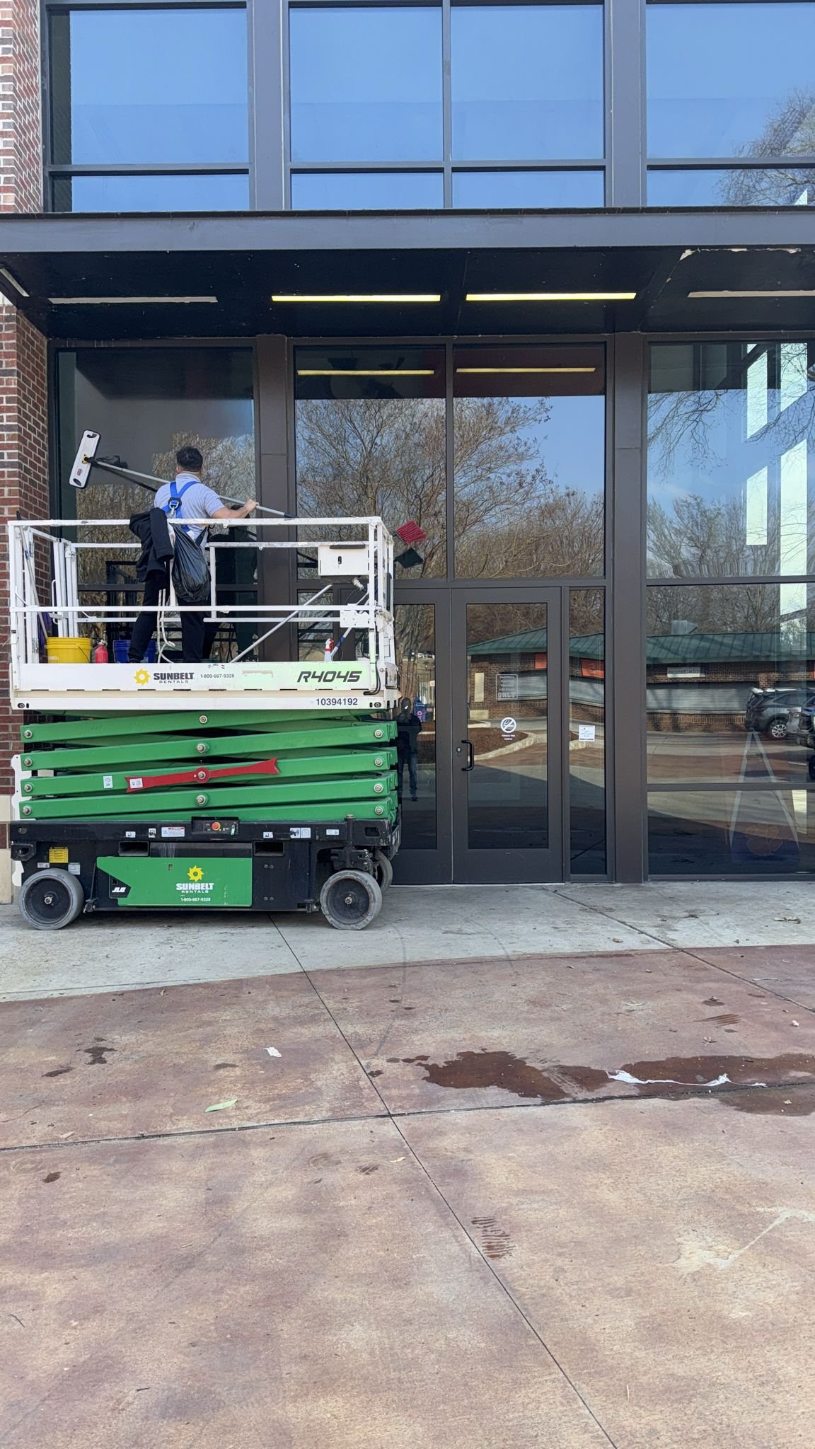 Building window cleaning with equipment